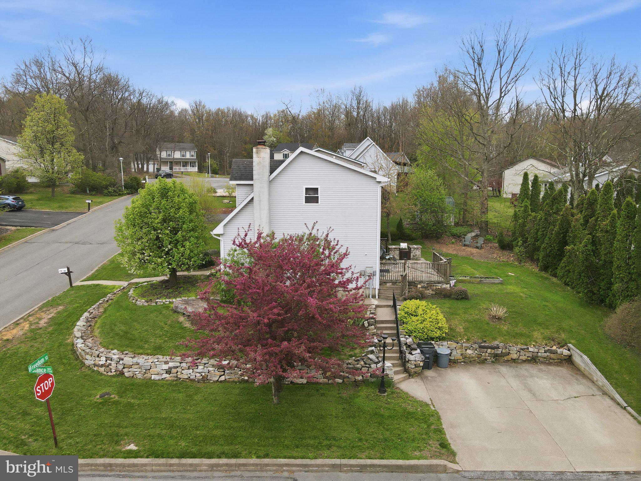 30 Freedom Street Hazleton, PA 18202 - Photo 77 of 84 Charming home with vibrant landscaping.