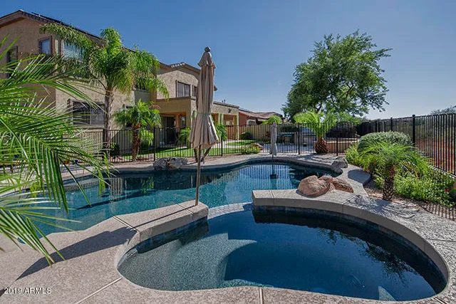 a view of a house with swimming pool