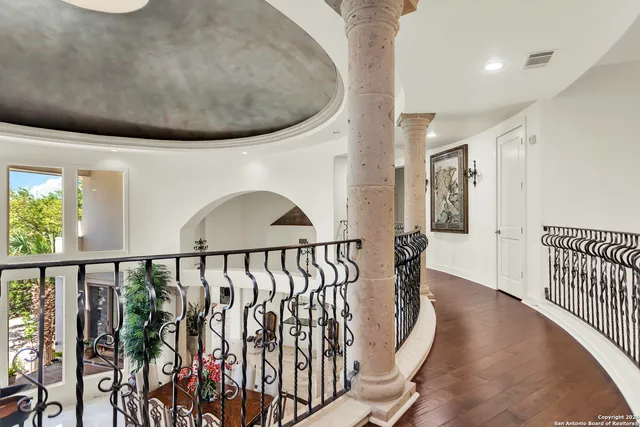 a view of entryway with wooden floor