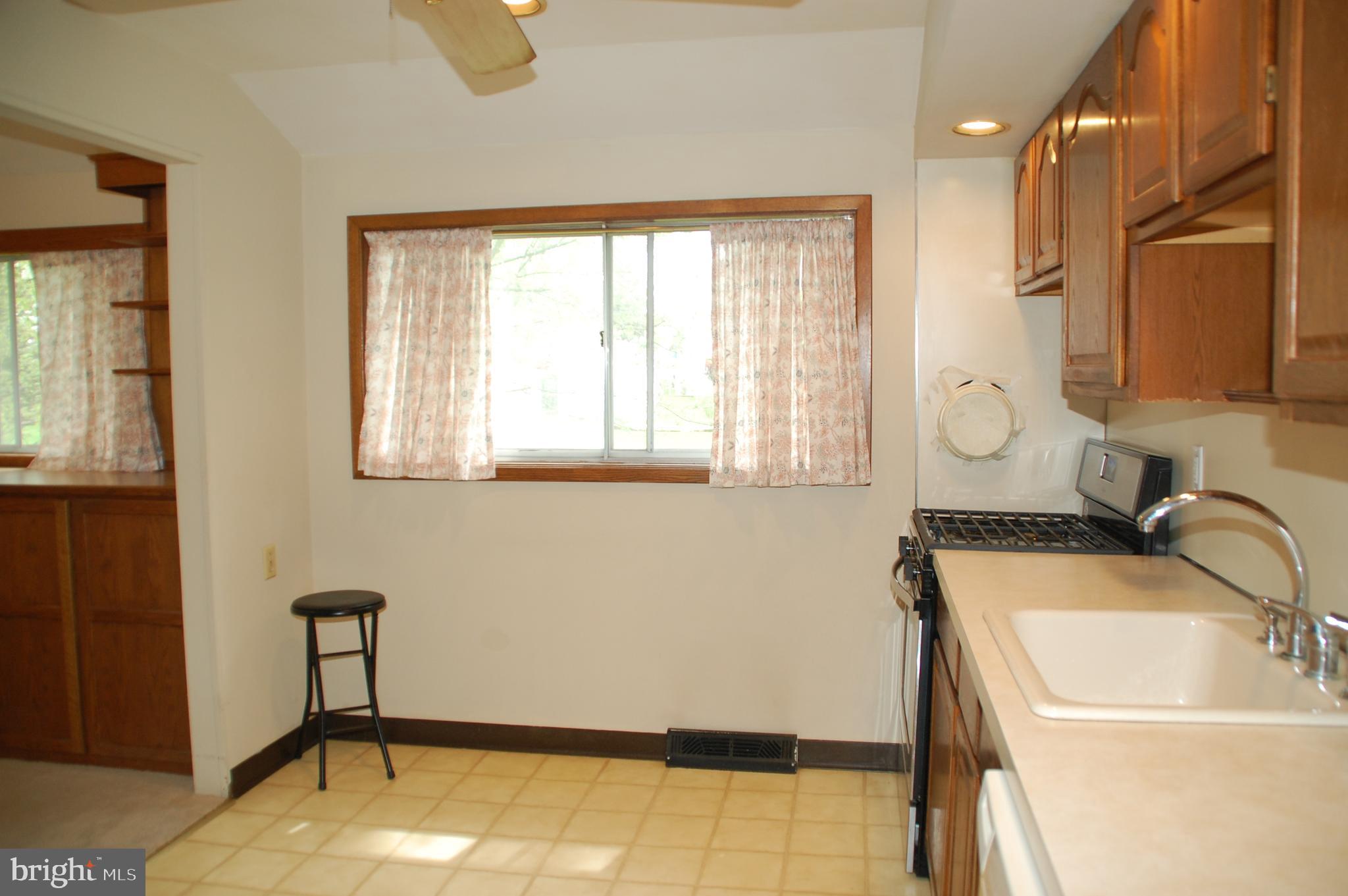 1366 Nevarc Road Warminster, PA 18974 - Photo 12 of 39 window, and stainless steel Whirlpool gas range.