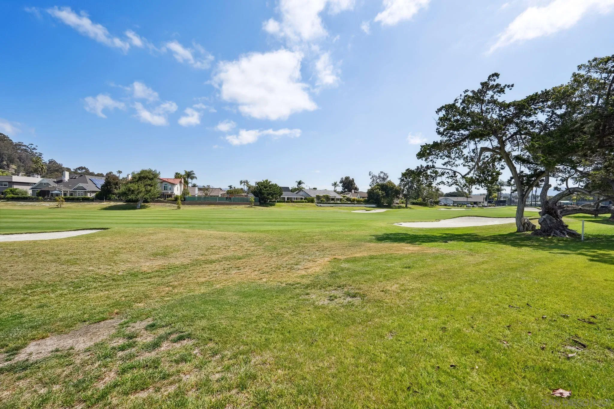 211 Via Osuna Rancho Santa Fe, CA 92091 - Photo 16 of 32 a view of a field with of trees in the background