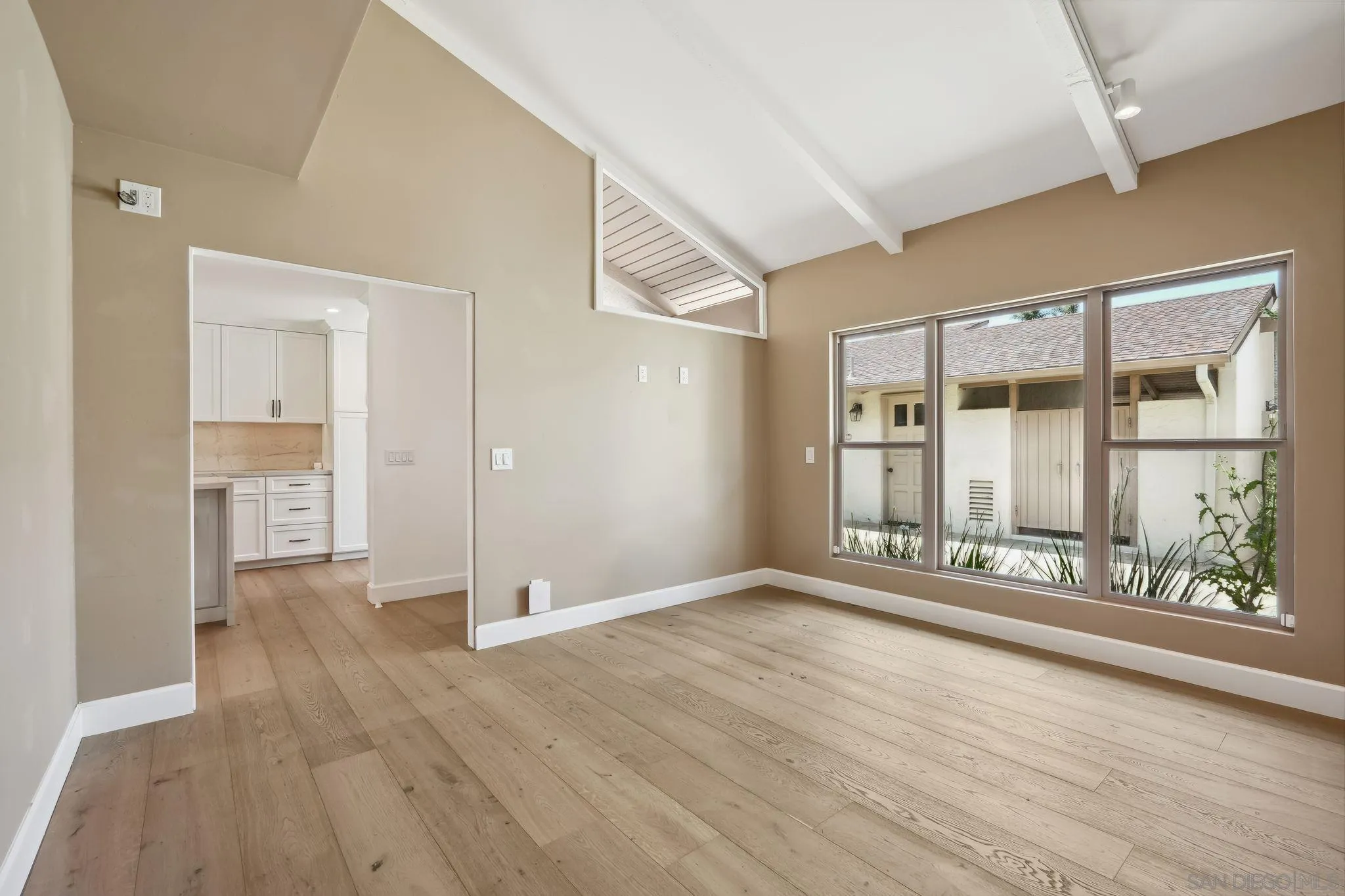 211 Via Osuna Rancho Santa Fe, CA 92091 - Photo 17 of 32 wooden floor in an empty room with a window