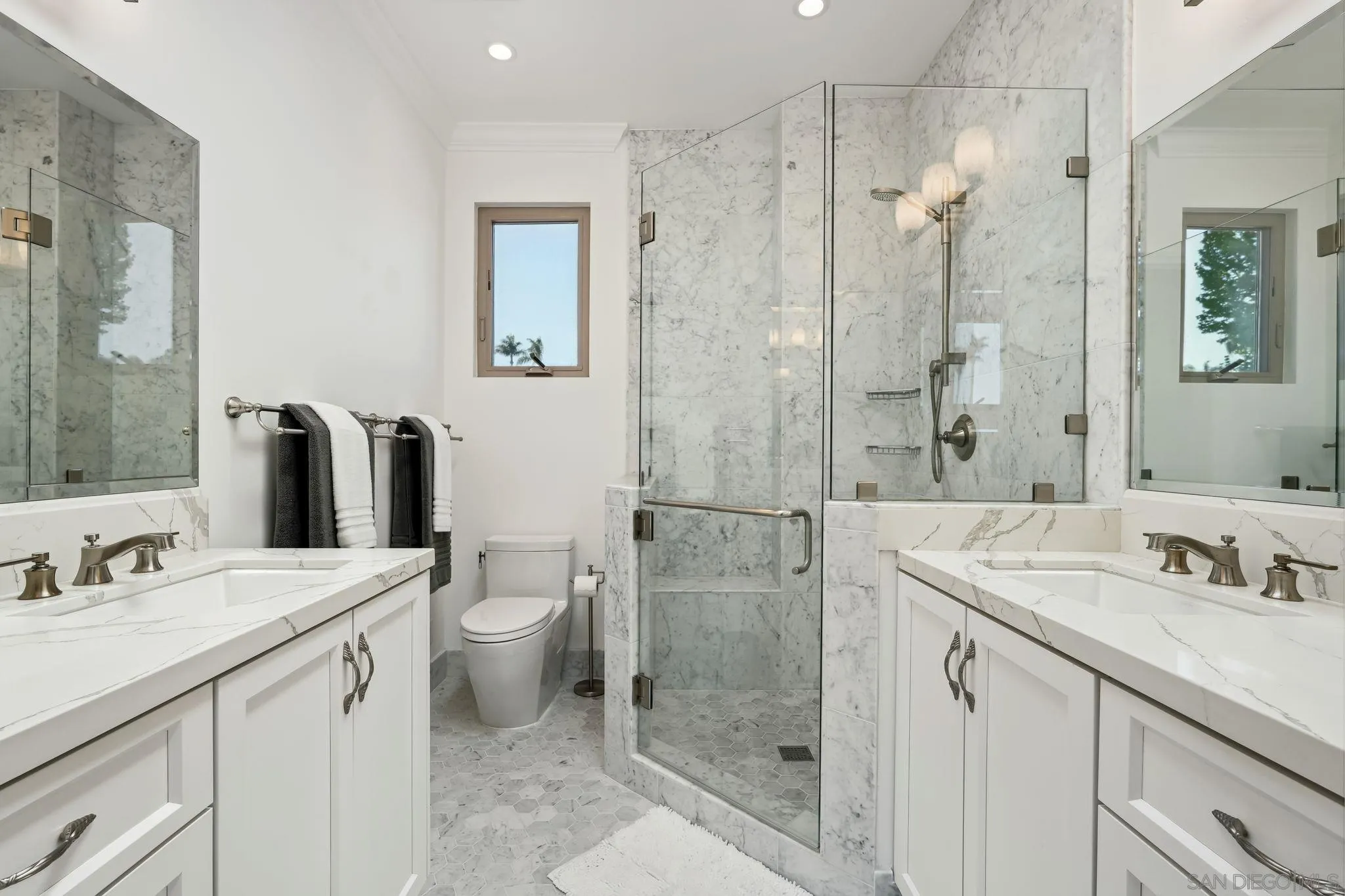 211 Via Osuna Rancho Santa Fe, CA 92091 - Photo 24 of 32 a bathroom with a sink toilet and shower
