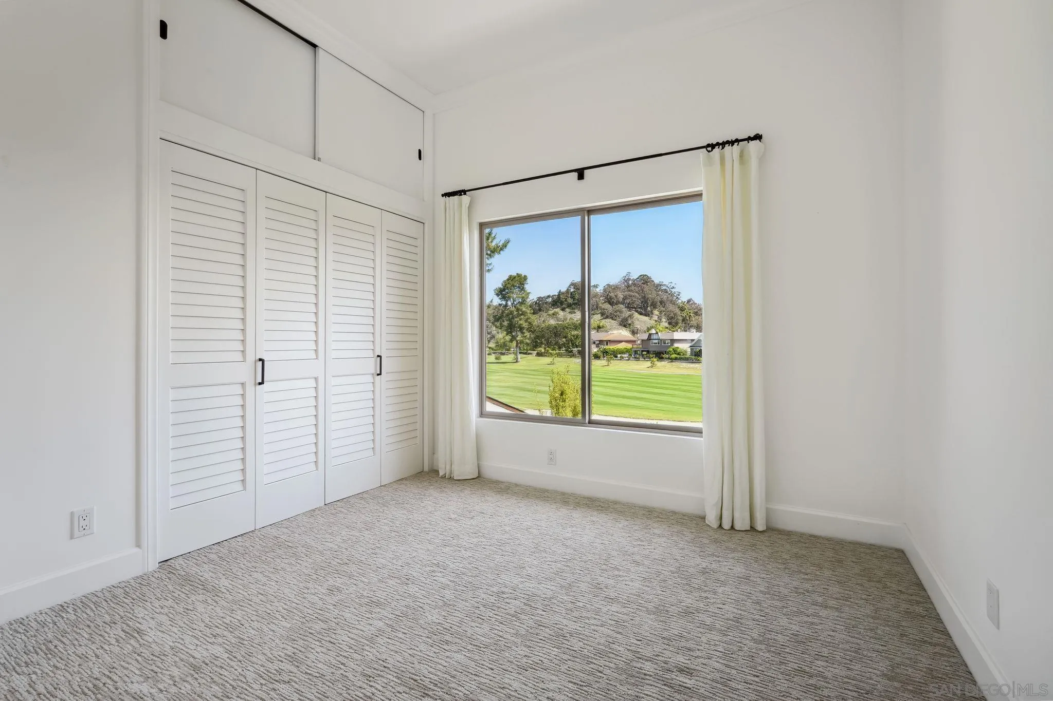 211 Via Osuna Rancho Santa Fe, CA 92091 - Photo 25 of 32 an empty room with windows