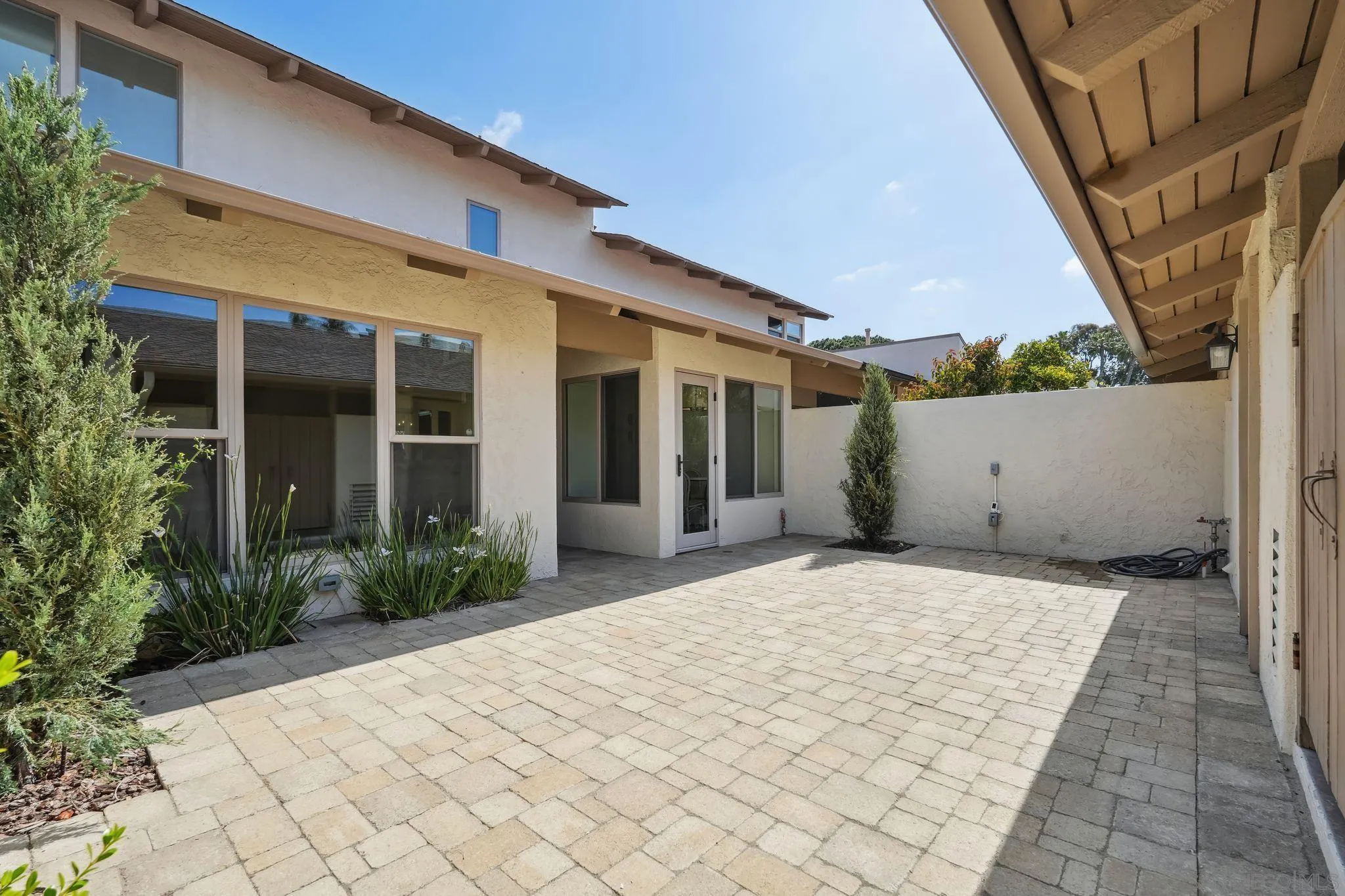 211 Via Osuna Rancho Santa Fe, CA 92091 - Photo 6 of 32 a entryway view with a backyard space
