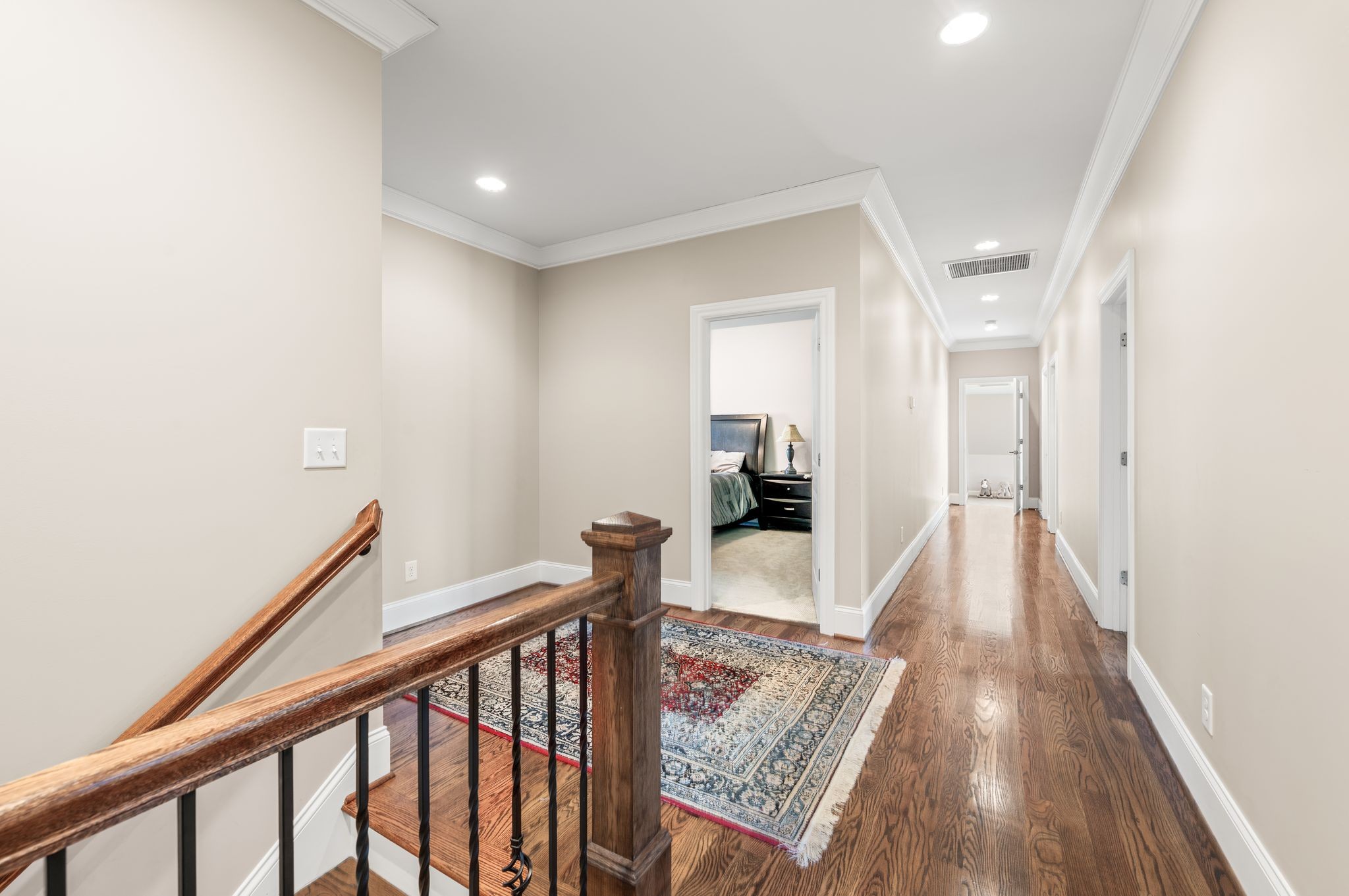 3509 Trimble Road Nashville, TN 37215 - Photo 50 of 80 a view of a hallway with wooden floor and staircase