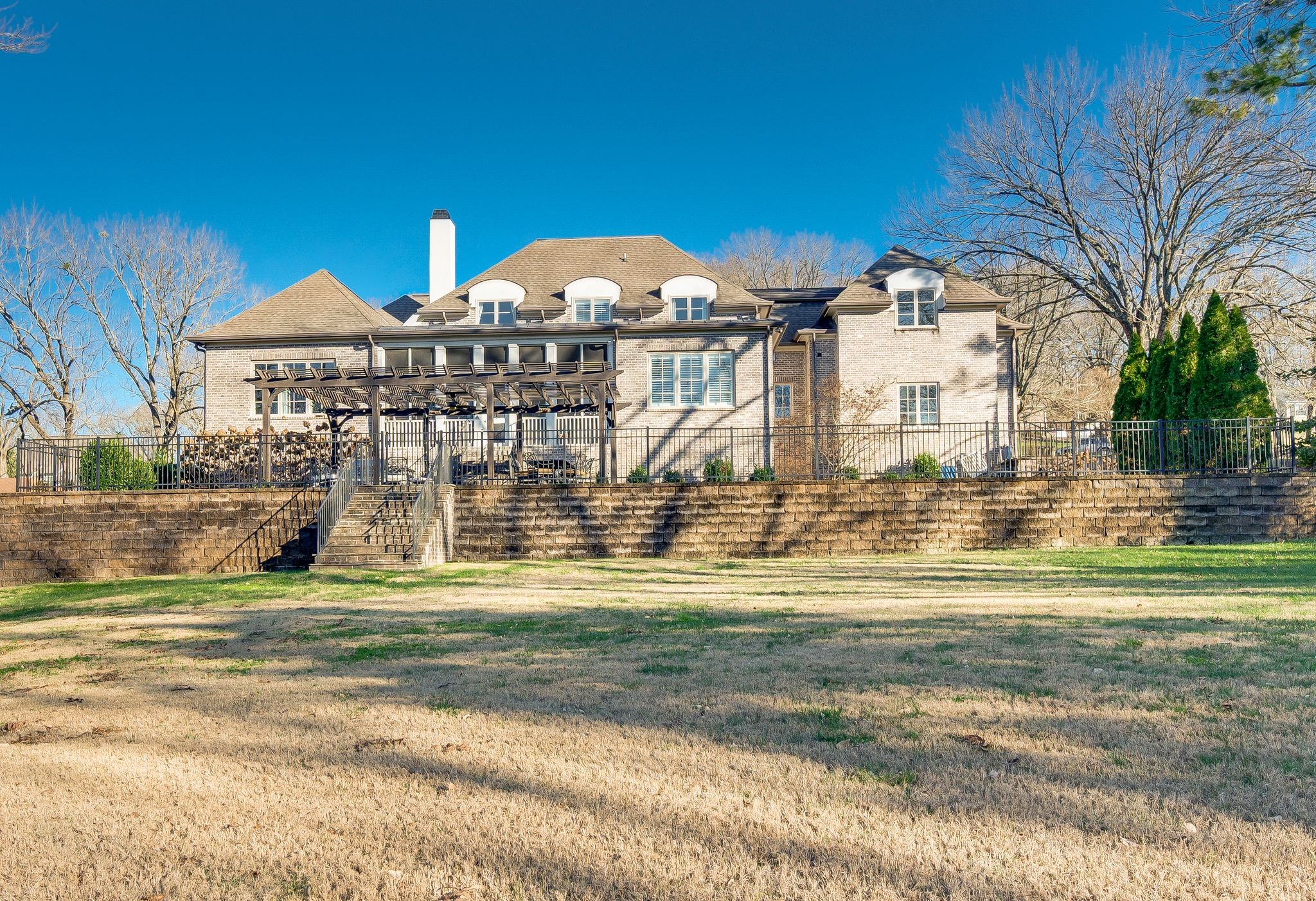 3509 Trimble Road Nashville, TN 37215 - Photo 76 of 80 a view of a big house with a big yard and large trees
