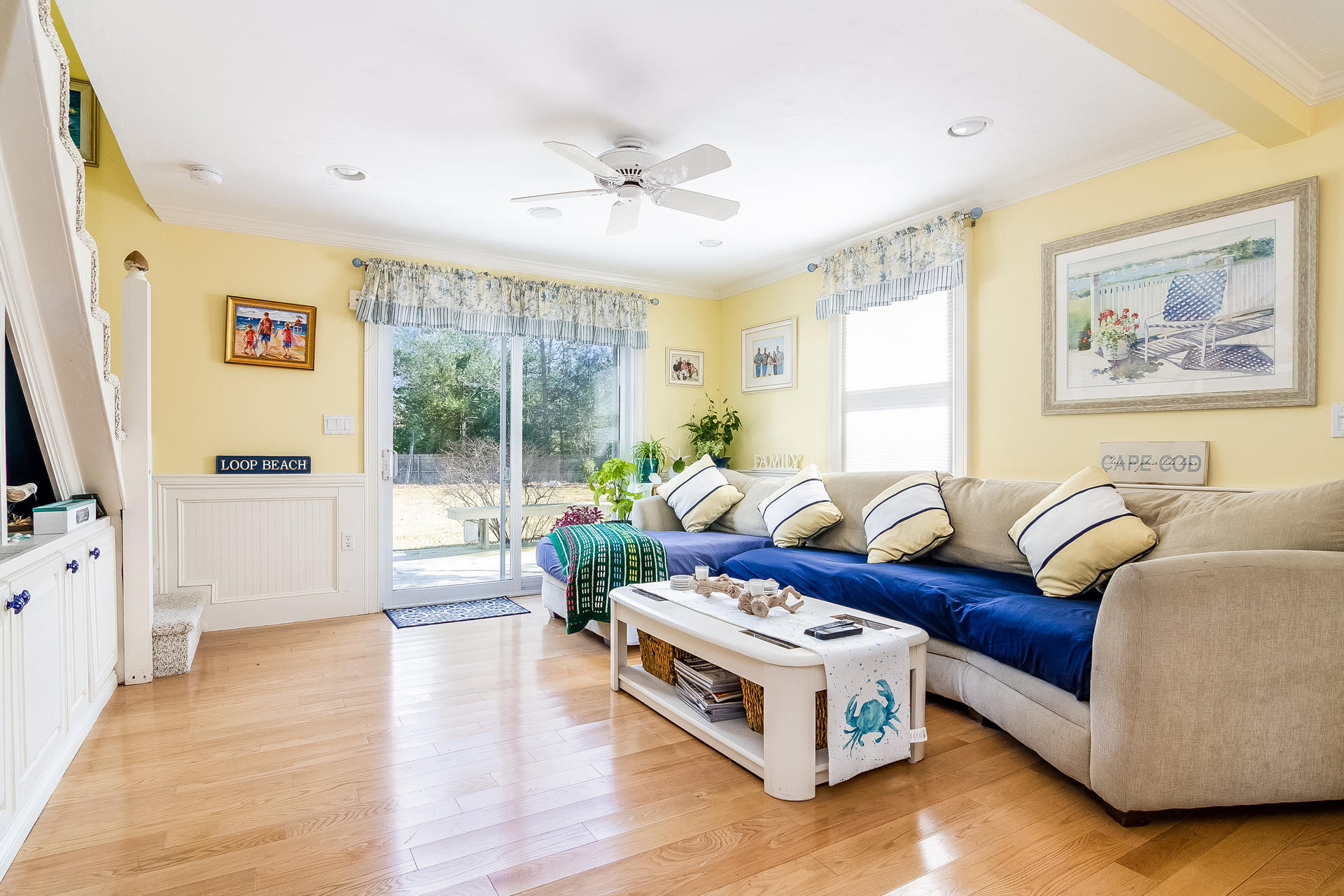 568 Santuit Road Cotuit, MA 02635 - Photo 17 of 30 a living room with furniture and a large window