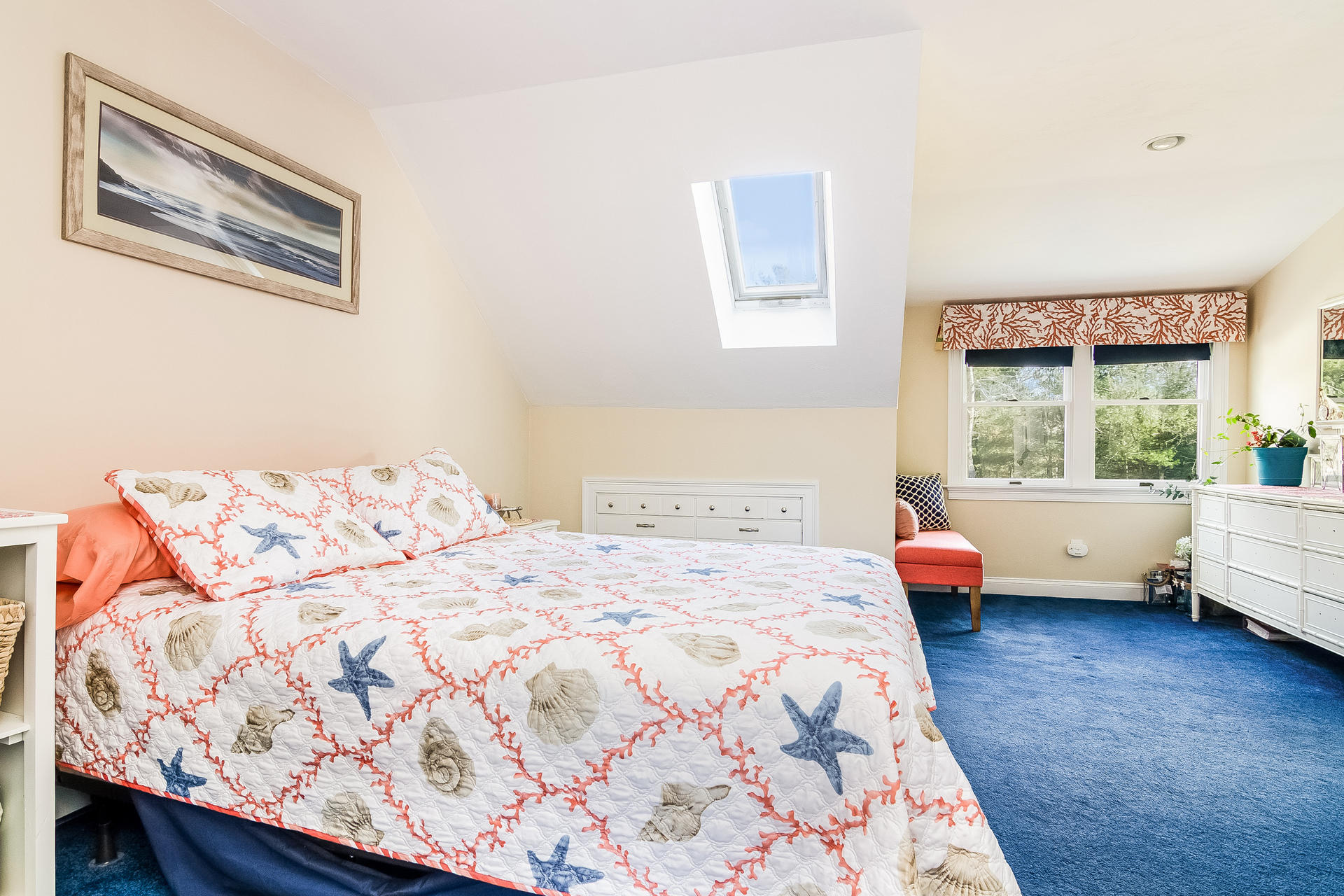 568 Santuit Road Cotuit, MA 02635 - Photo 23 of 30 a bedroom with a bed and wooden floor