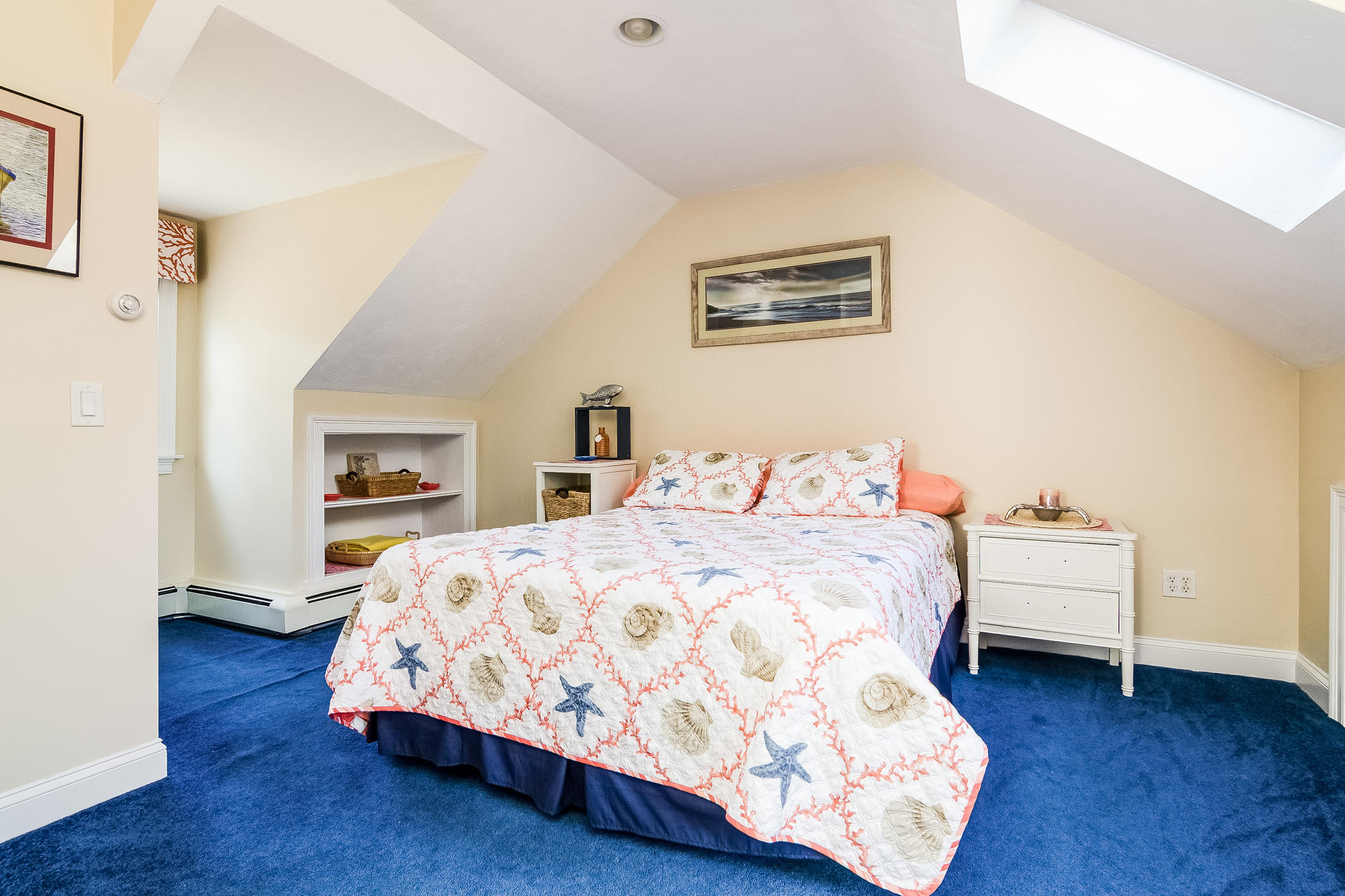 568 Santuit Road Cotuit, MA 02635 - Photo 24 of 30 a bedroom with a bed and a table