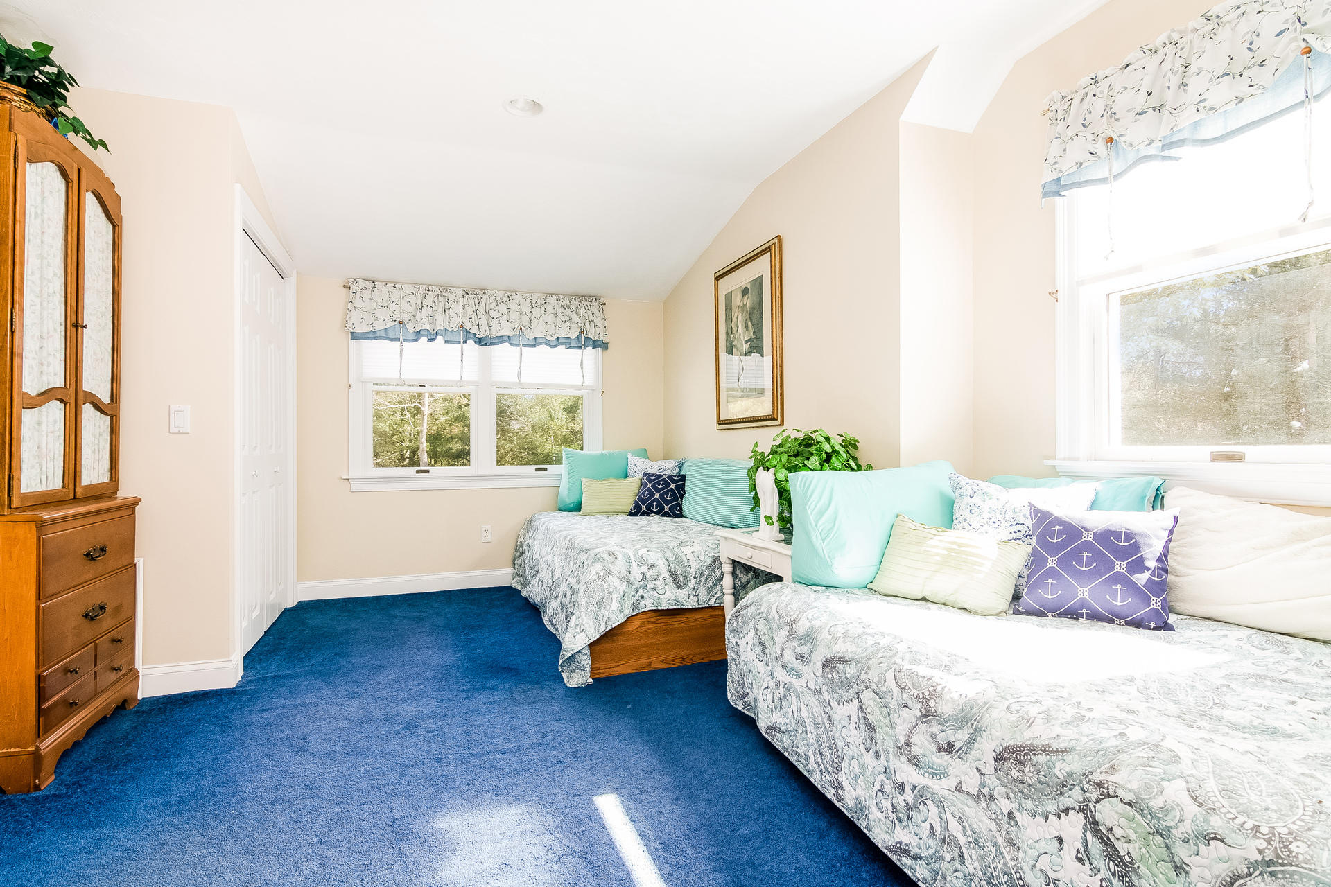 568 Santuit Road Cotuit, MA 02635 - Photo 25 of 30 a bed room with bed and a window