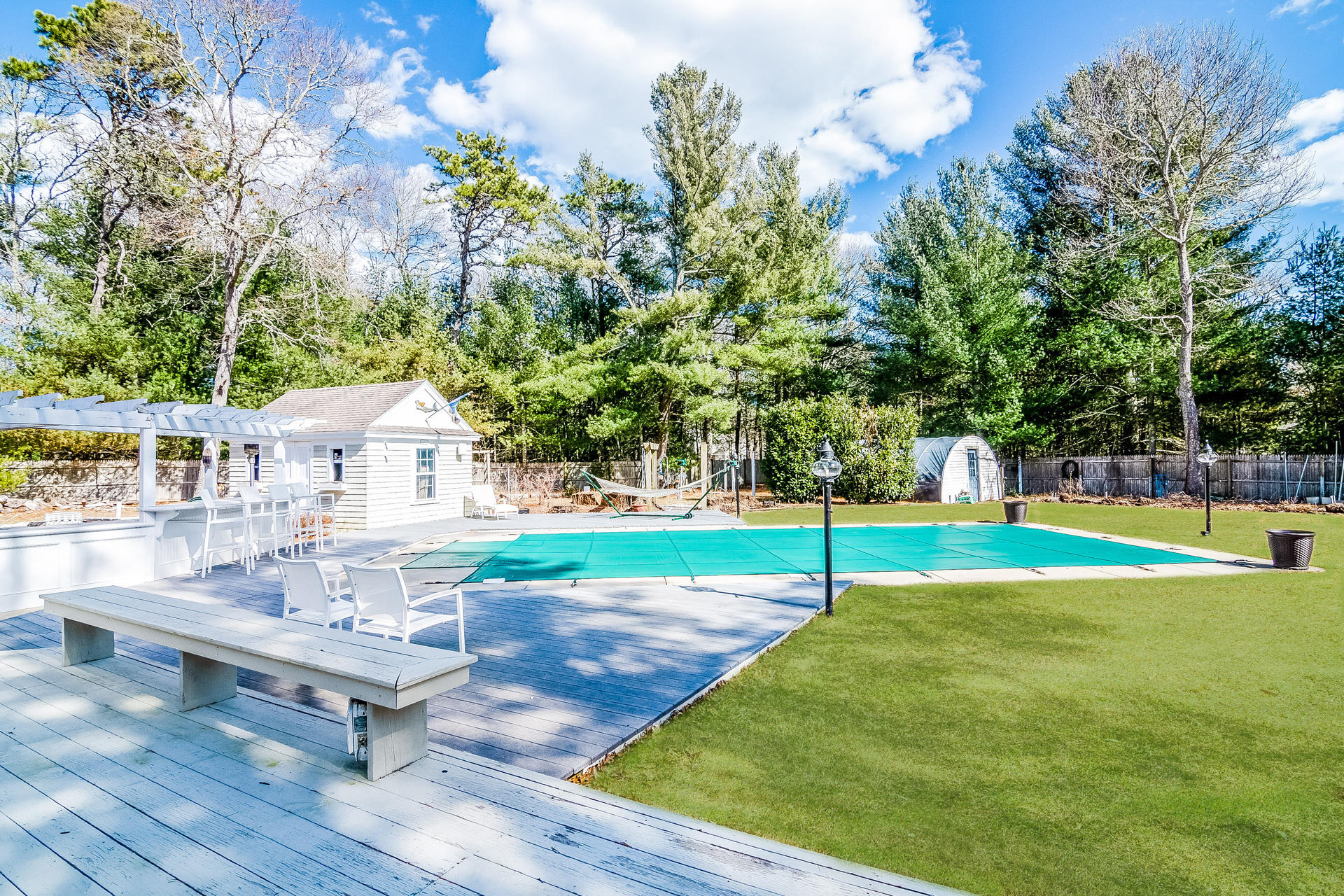 568 Santuit Road Cotuit, MA 02635 - Photo 4 of 30 a view of a house with swimming pool and sitting area