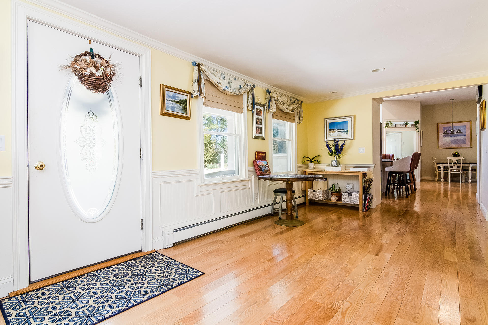 568 Santuit Road Cotuit, MA 02635 - Photo 8 of 30 a living room with furniture and a table
