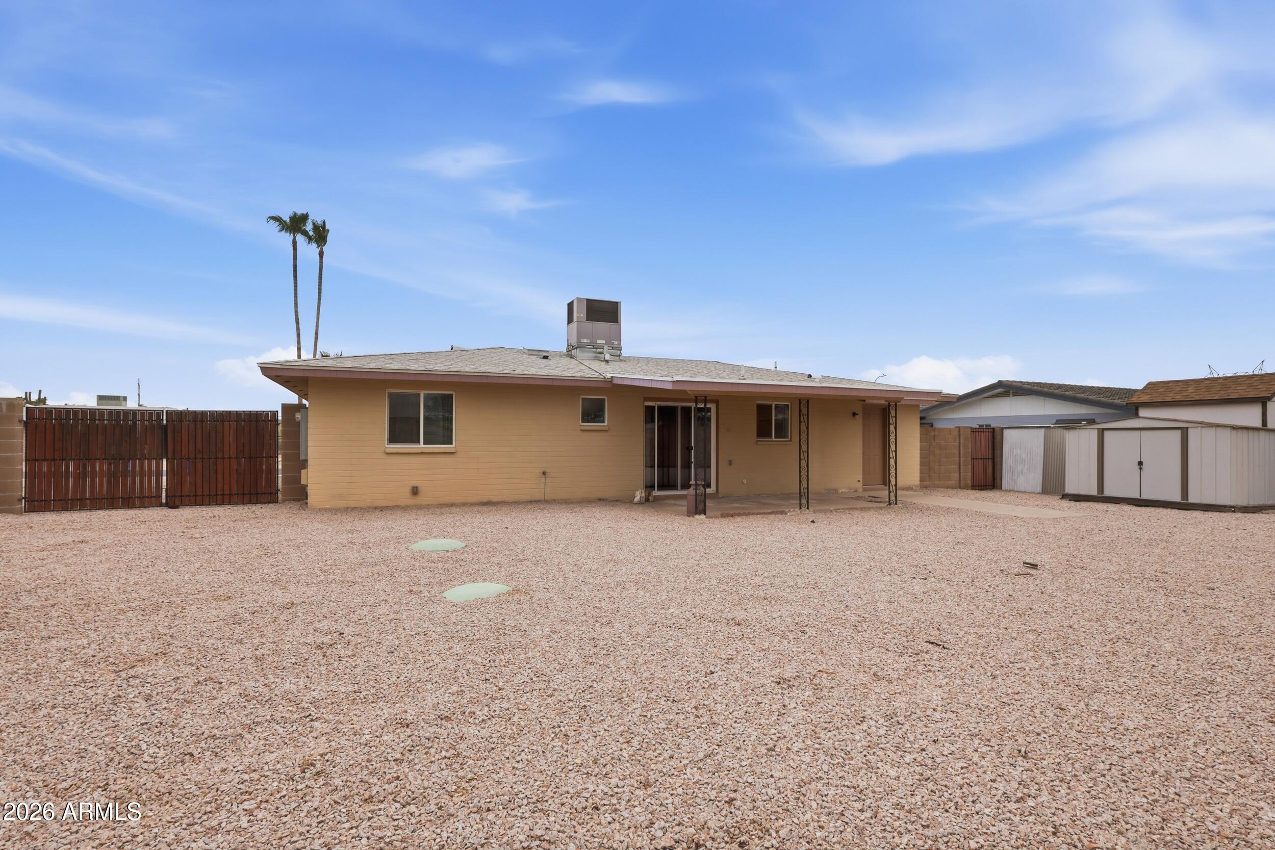 6256 East Decatur Street Mesa, AZ 85205 - Photo 17 of 25 Backyard with RV Gate