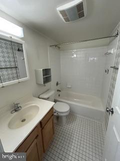 1700 W Street Southeast, Unit 5 Washington, DC 20020 - Photo 13 of 15 a bathroom with a sink a toilet and shower