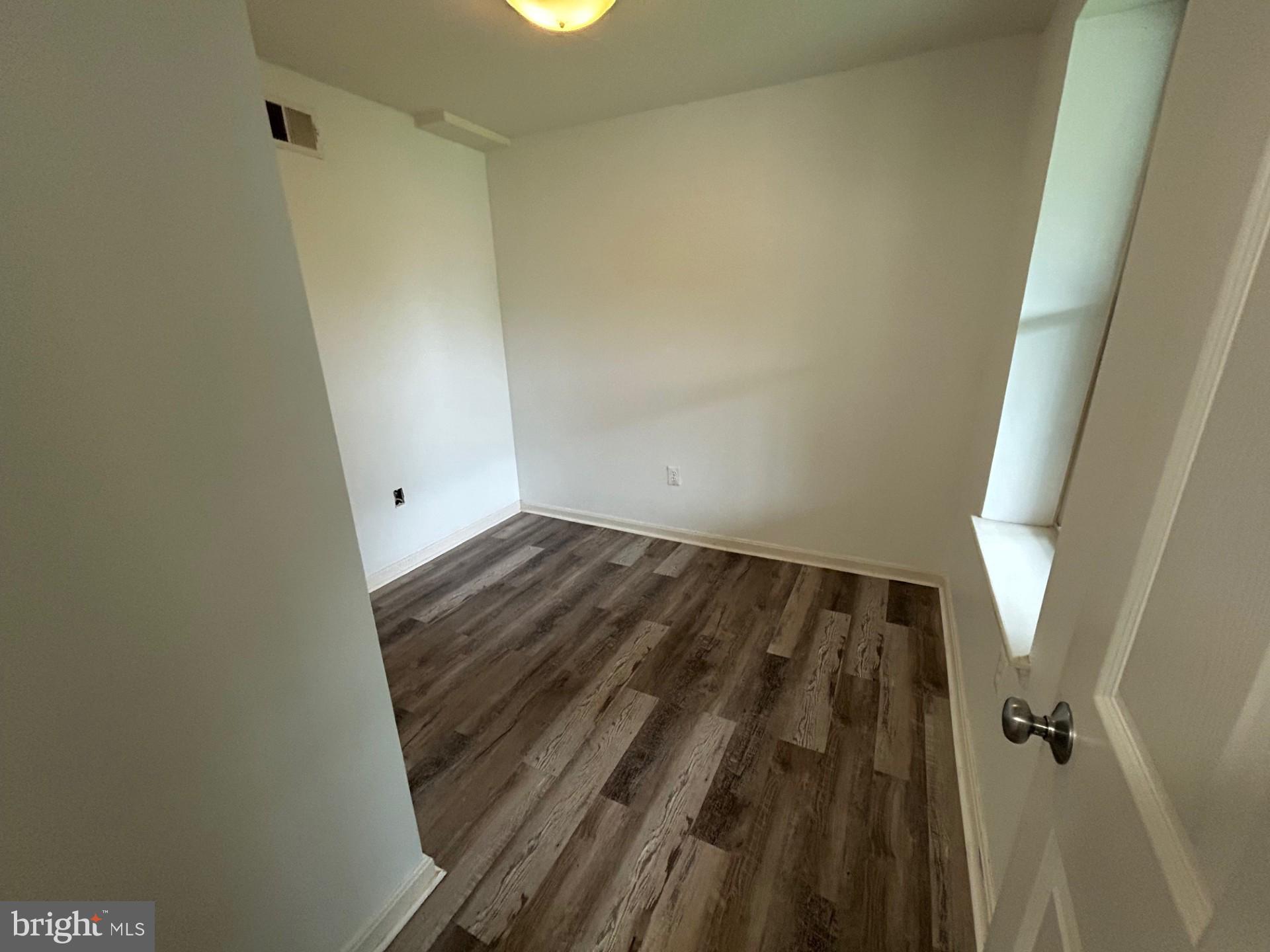 1700 W Street Southeast, Unit 5 Washington, DC 20020 - Photo 7 of 15 a view of wooden floor
