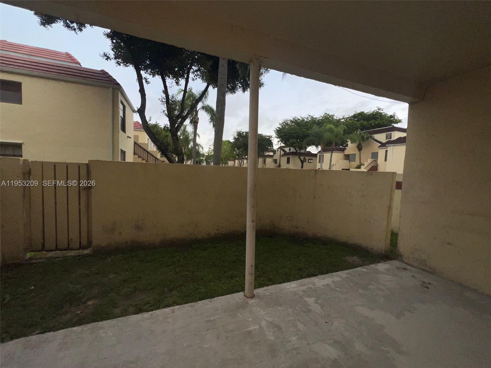 8831 Southwest 130th Place, Unit 106 Miami, FL 33186 - Photo 12 of 15 a view of a porch