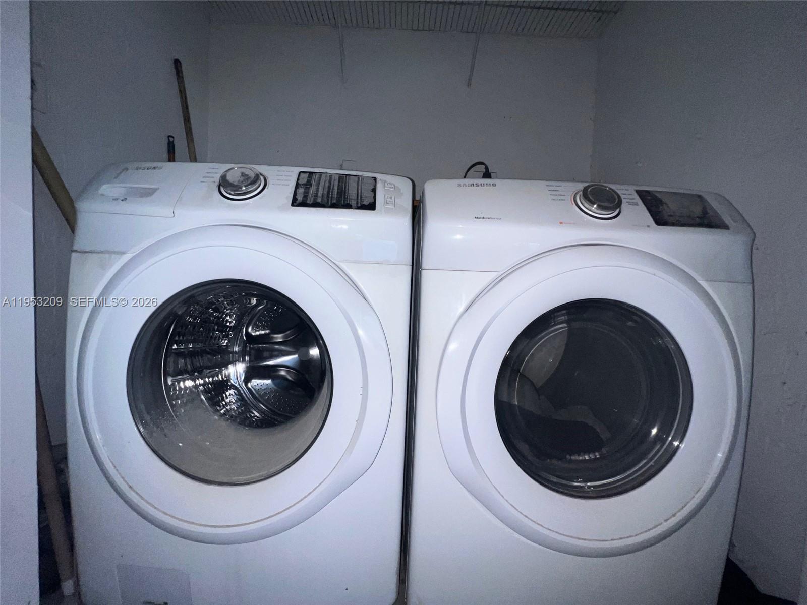 8831 Southwest 130th Place, Unit 106 Miami, FL 33186 - Photo 10 of 15 a close up view of washer and dryer