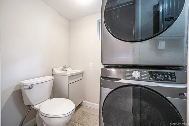 a bathroom with a toilet and a sink