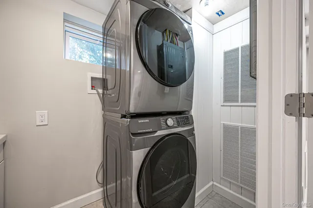 a utility room with dryer and washer