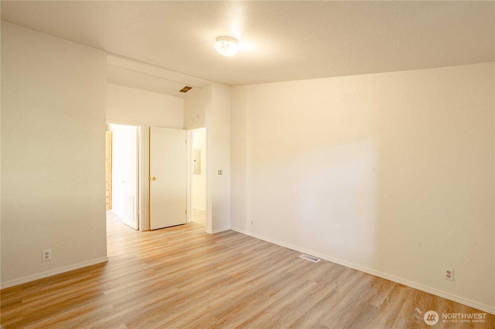 111 Spring Court Vader, WA 98593 - Photo 25 of 27 a view of empty room with wooden floor