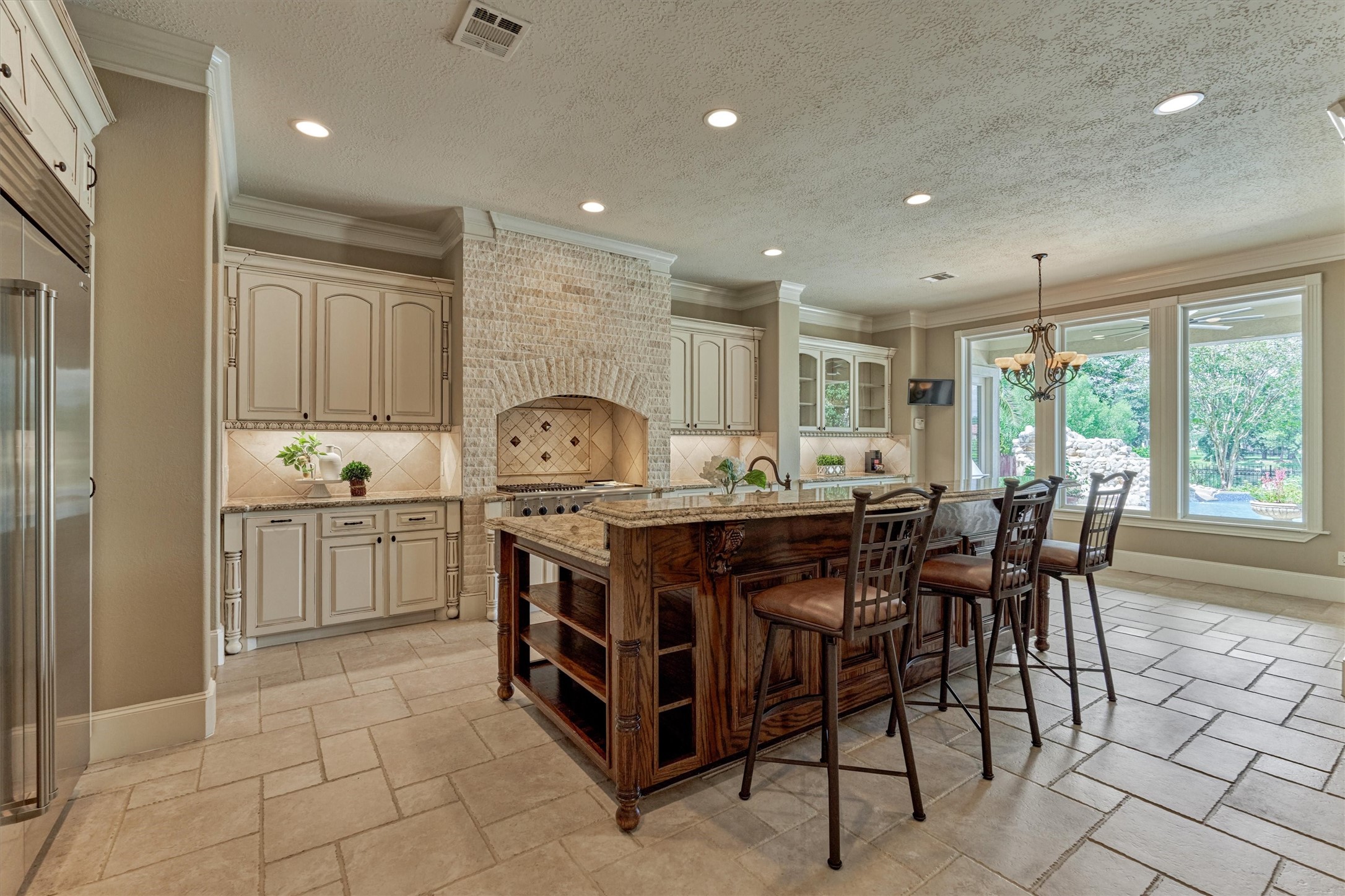 7806 Bent Green Lane Spring, TX 77389 - Photo 11 of 50 a kitchen with a table chairs sink and cabinets