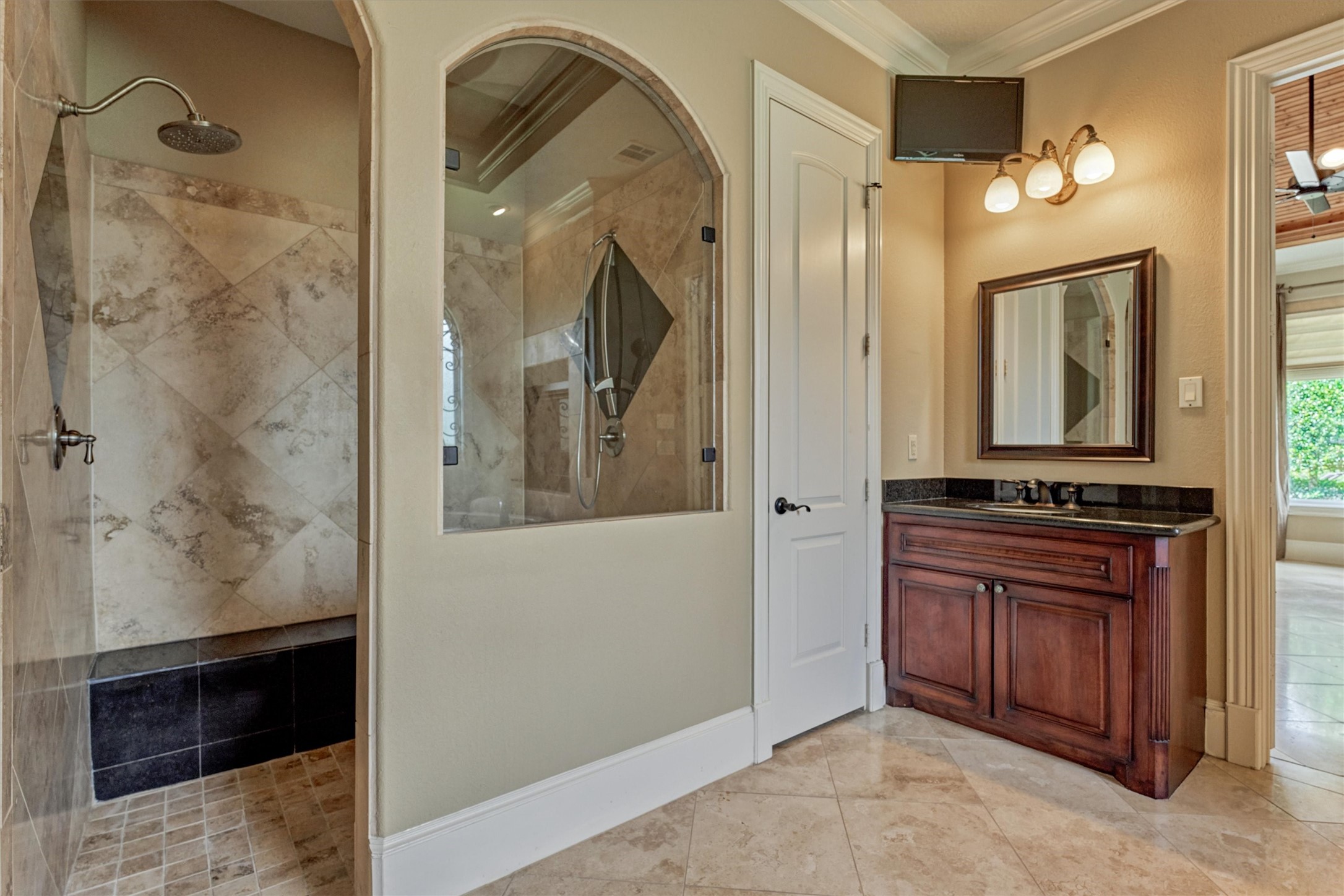 7806 Bent Green Lane Spring, TX 77389 - Photo 20 of 50 a bathroom with a mirror and a shower