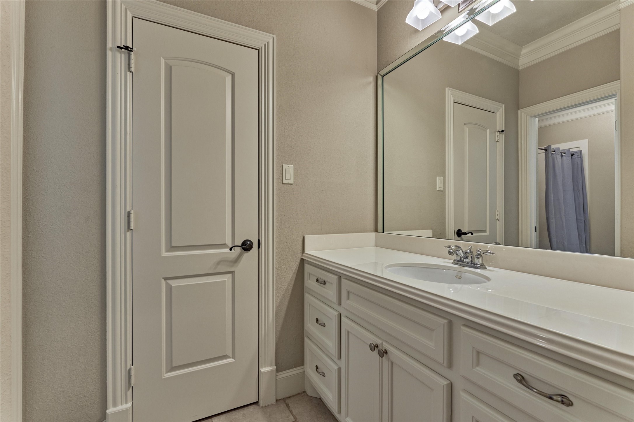 7806 Bent Green Lane Spring, TX 77389 - Photo 33 of 50 a bathroom with a sink and a mirror