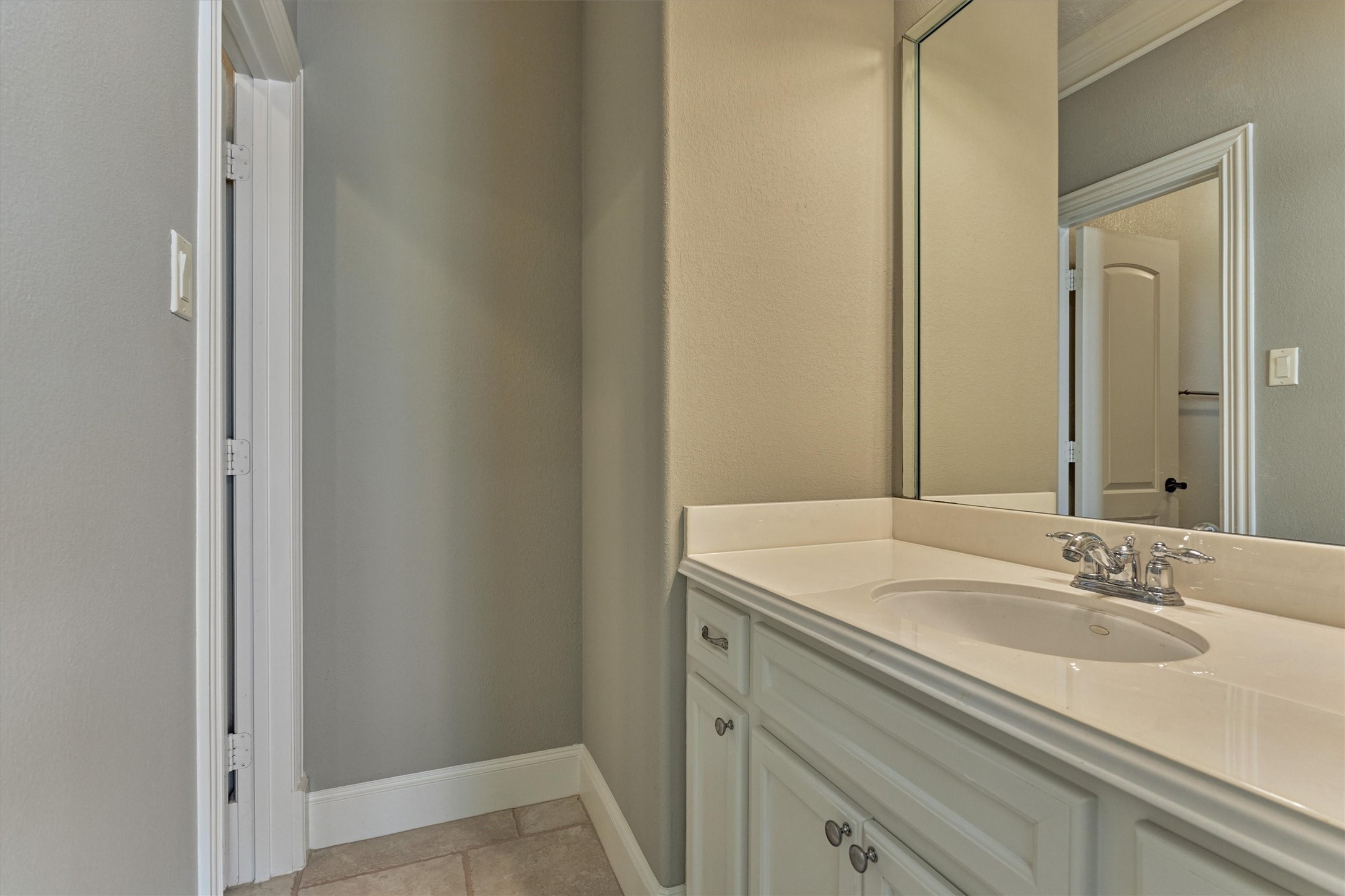 7806 Bent Green Lane Spring, TX 77389 - Photo 35 of 50 a bathroom with a sink and a mirror