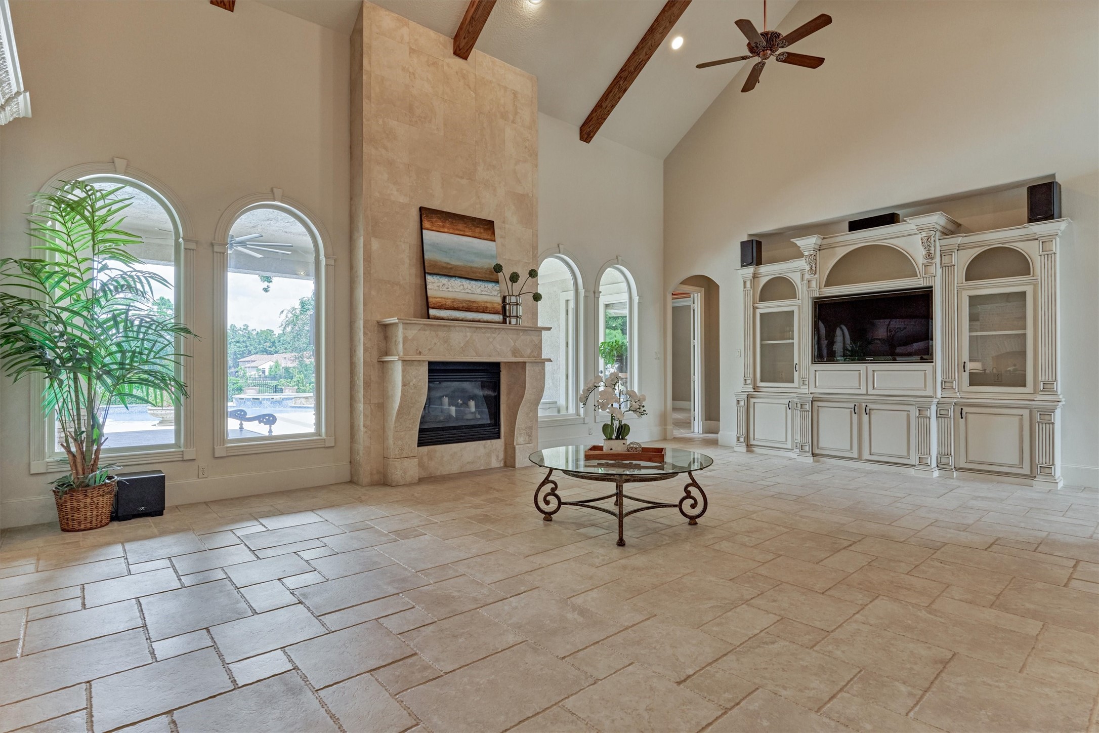 7806 Bent Green Lane Spring, TX 77389 - Photo 8 of 50 a living room with patio furniture and a fireplace