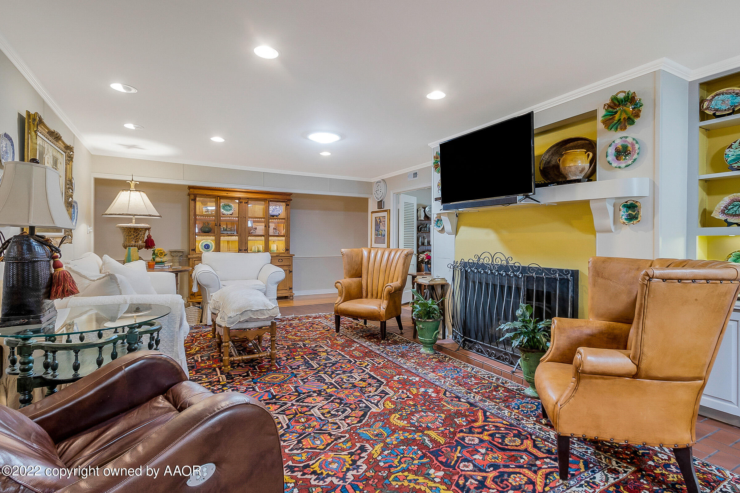 1601 South Austin Street Amarillo, TX 79102 - Photo 11 of 46 a living room with furniture and a flat screen tv