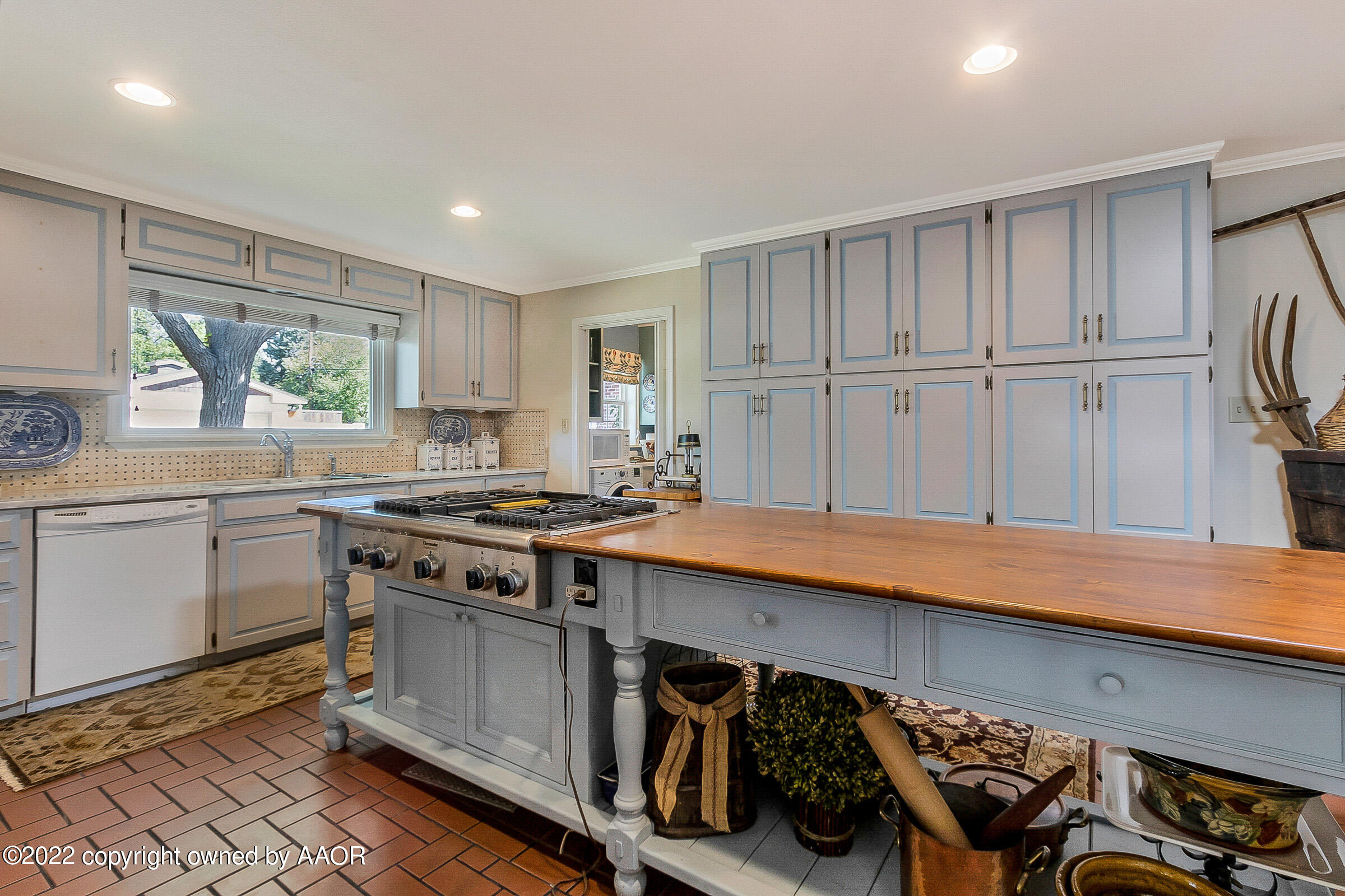 1601 South Austin Street Amarillo, TX 79102 - Photo 14 of 46 a kitchen with stainless steel appliances granite countertop a stove a sink and a refrigerator