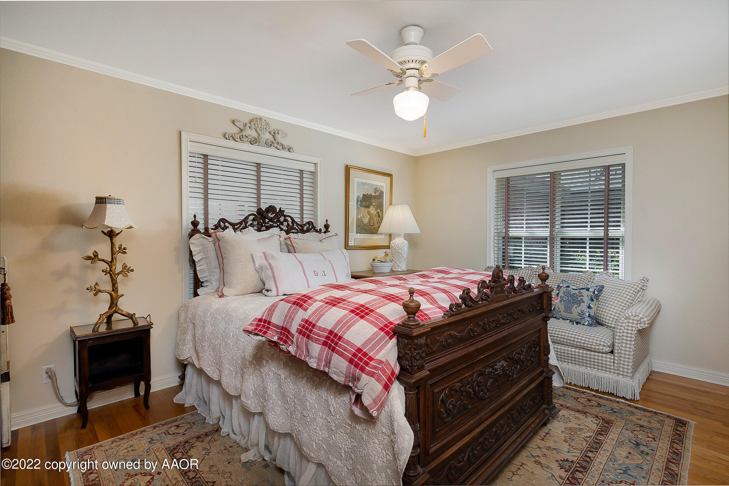 1601 South Austin Street Amarillo, TX 79102 - Photo 31 of 46 a bedroom with a bed and a chandelier