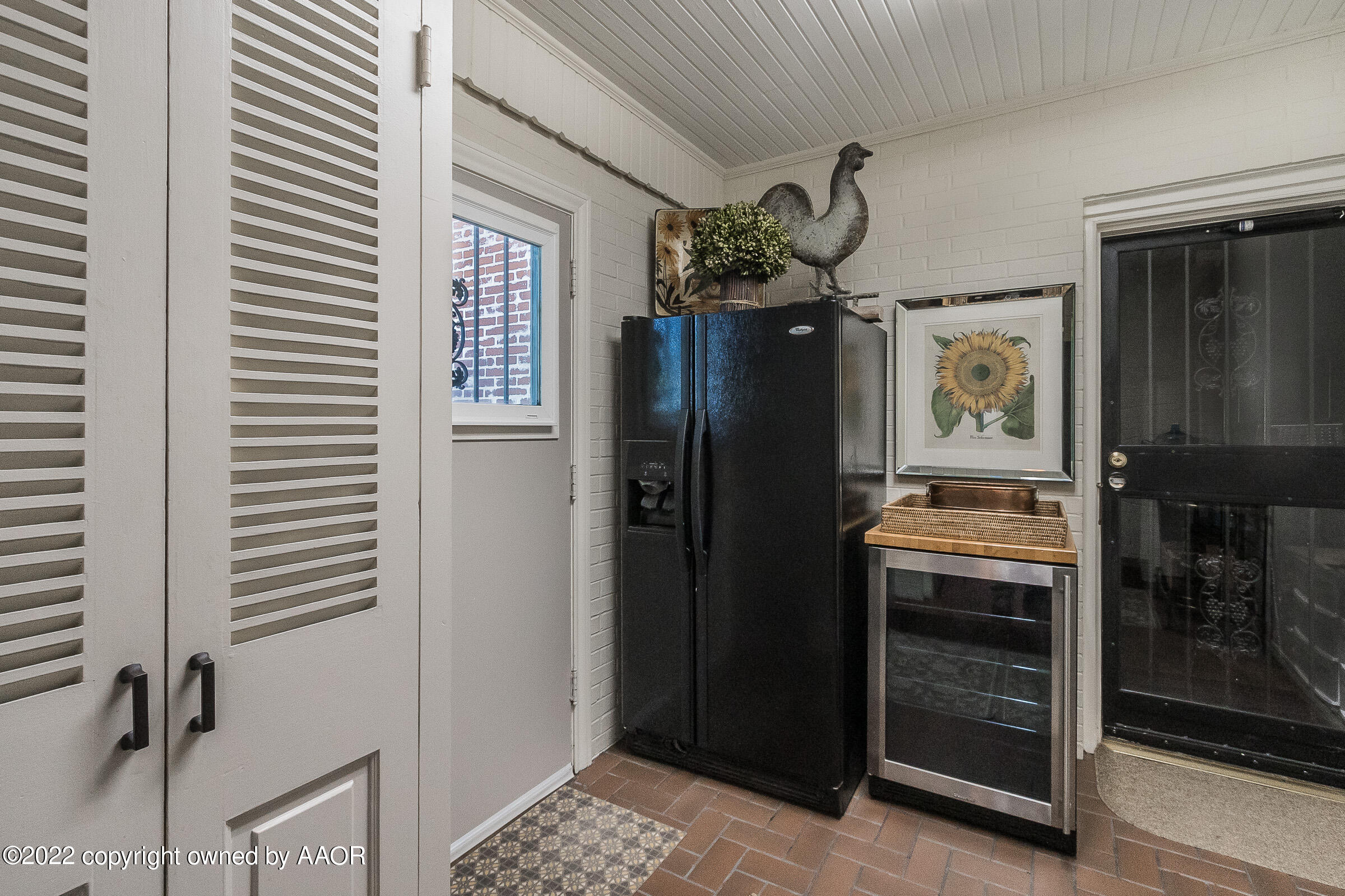 1601 South Austin Street Amarillo, TX 79102 - Photo 39 of 46 a kitchen with a refrigerator and cabinets