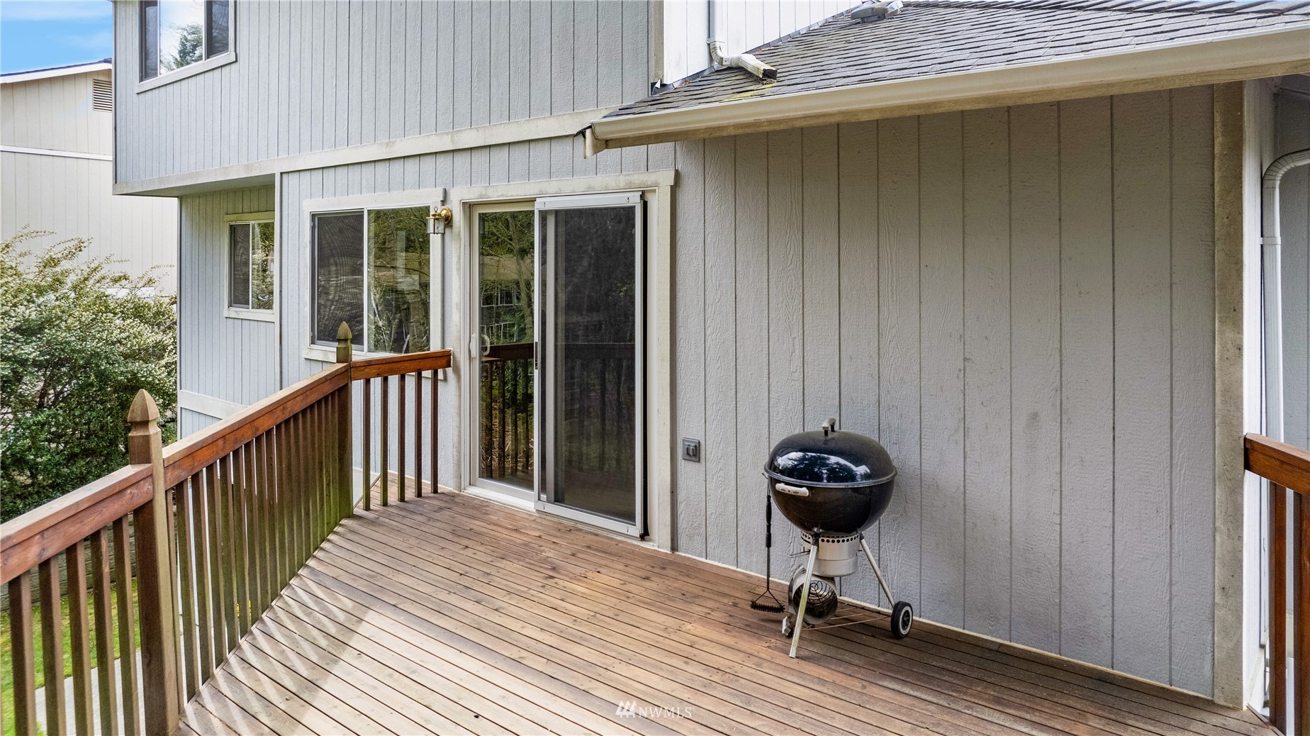 15 73rd Street Southwest Everett, WA 98203 - Photo 8 of 37 a view of a balcony with wooden floor and potted plant