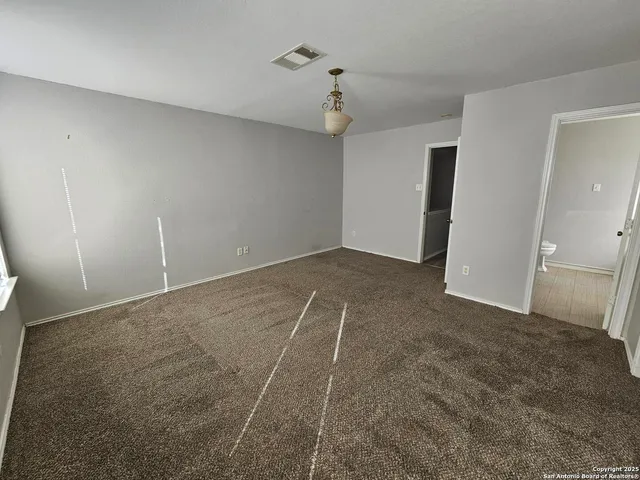 a view of a room with an empty space