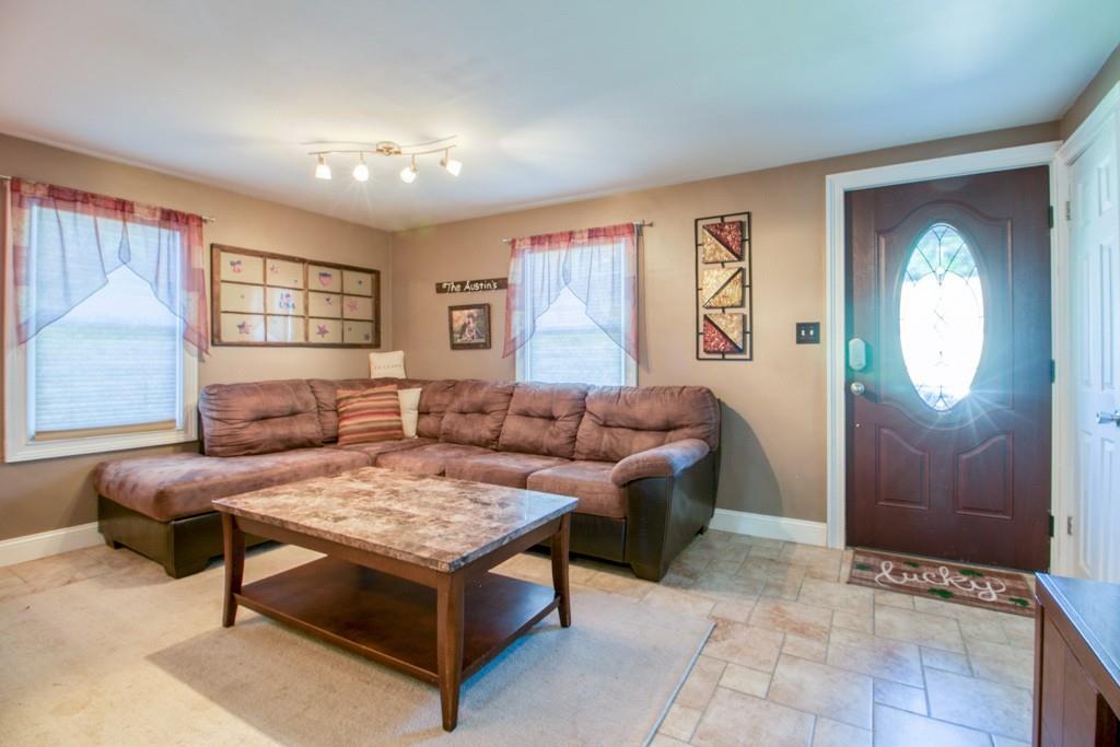 146 Powell Avenue Springfield, MA 01118 - Photo 9 of 22 a living room with furniture and a large window