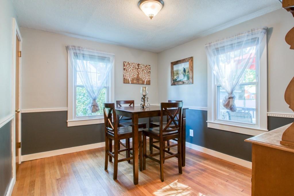 146 Powell Avenue Springfield, MA 01118 - Photo 10 of 22 a view of a dining room with furniture and windows