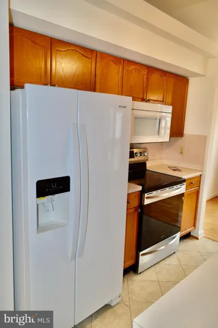 a utility room with washer and dryer