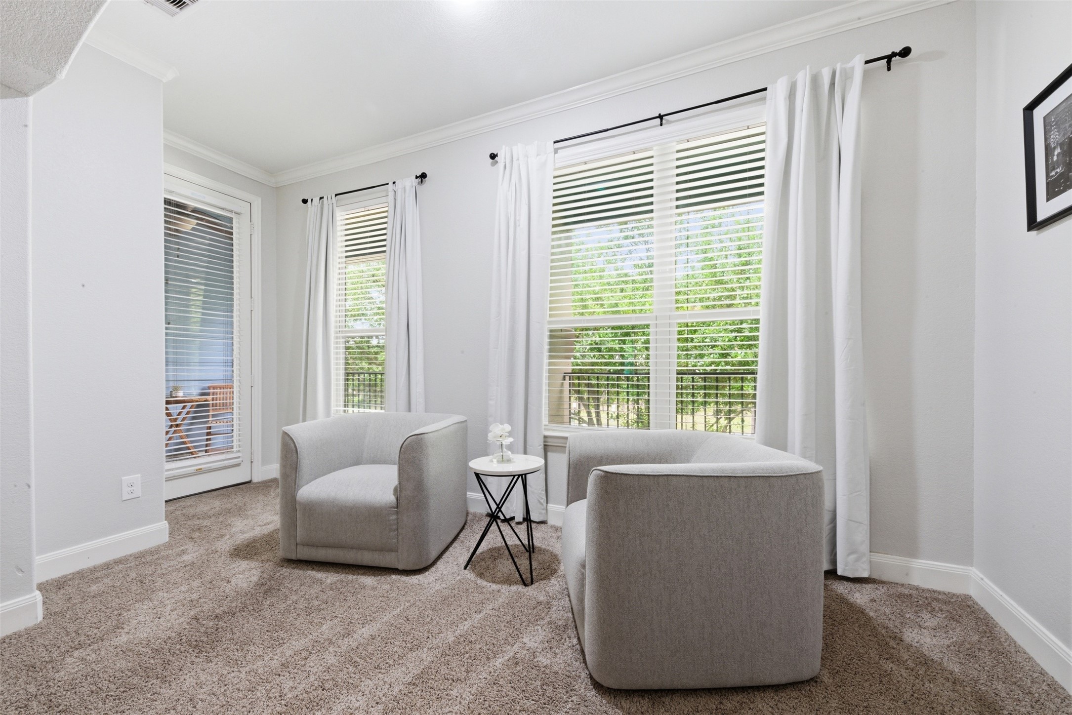 706 Water Street Webster, TX 77598 - Photo 13 of 23 A flexible sitting area creates the perfect spot to unwind or recharge.