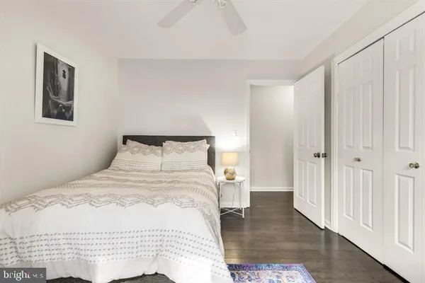 a large white bed in a white room