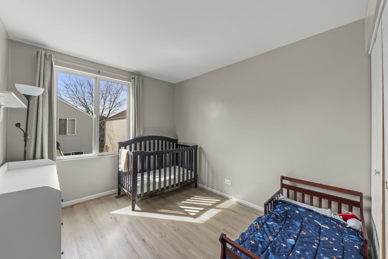 1719 Ravine Park Lane Aurora, IL 60504 - Photo 12 of 23 a bedroom with furniture and a window