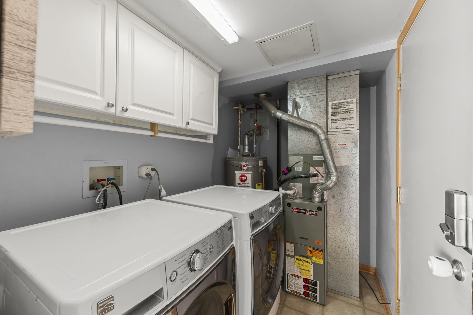 1719 Ravine Park Lane Aurora, IL 60504 - Photo 18 of 23 a room with storage and utility