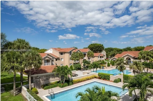 an aerial view of house with yard