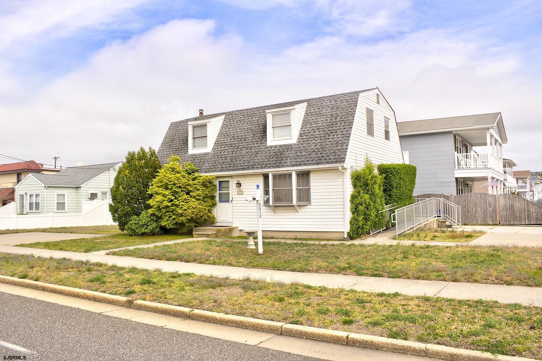 4010 West Brigantine Avenue Brigantine, NJ 08203 - Photo 1 of 10 front view of a house with a big yard