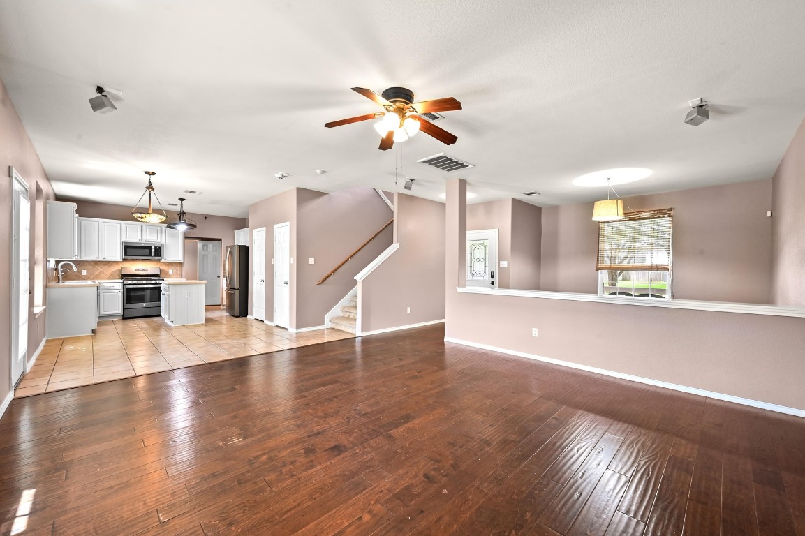 964 Hometown Parkway Kyle, TX 78640 - Photo 11 of 38 a view of an empty room and kitchen view