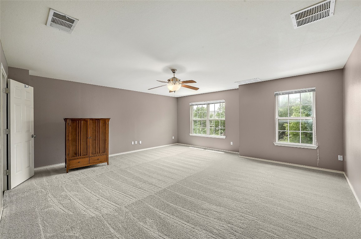 964 Hometown Parkway Kyle, TX 78640 - Photo 18 of 38 a view of an empty room with a window