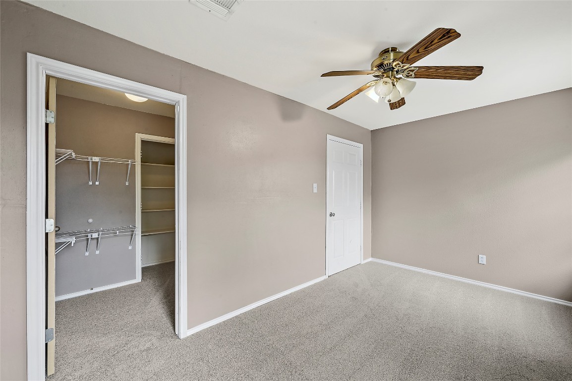 964 Hometown Parkway Kyle, TX 78640 - Photo 25 of 38 a view of a chandelier fan and entryway