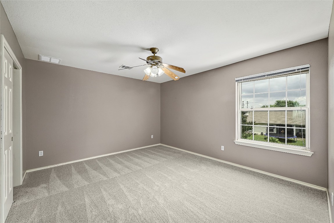 964 Hometown Parkway Kyle, TX 78640 - Photo 26 of 38 a view of an empty room with a window