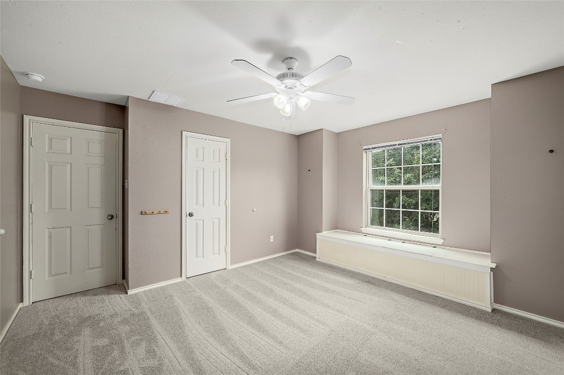 964 Hometown Parkway Kyle, TX 78640 - Photo 29 of 38 a view of an empty room with a window